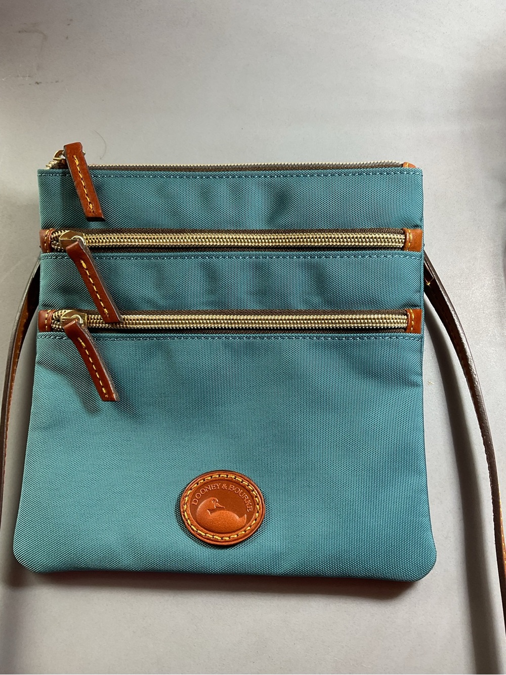 Dooney & Bourke Teal Triple-Zip Nylon Crossbody with Tan Trim